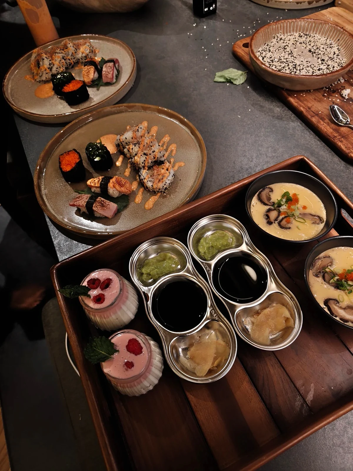 Japanese dishes and bowls arranged across a dining table